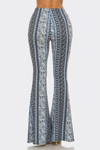 Load image into Gallery viewer, Patterned flared pants on a white background