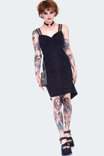 Load image into Gallery viewer, Person wearing a black dress with lace details on a white background