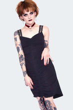 Load image into Gallery viewer, Woman wearing a black dress with lace details on a white background