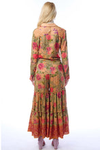Load image into Gallery viewer, Woman wearing a floral dress with long sleeves on a white background