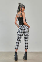 Load image into Gallery viewer, Person wearing a black tank top and plaid pants against a plain background