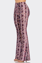 Load image into Gallery viewer, Patterned pants on a white background