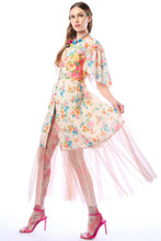 Load image into Gallery viewer, Woman wearing a floral dress with sheer sleeves on a white background