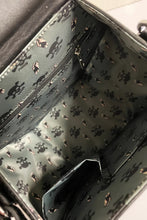 Load image into Gallery viewer, Poison Black and White Striped Glow In The Dark Purse