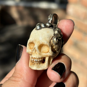 Carved Bone Skull Pendant