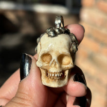 Load image into Gallery viewer, Carved Bone Skull Pendant
