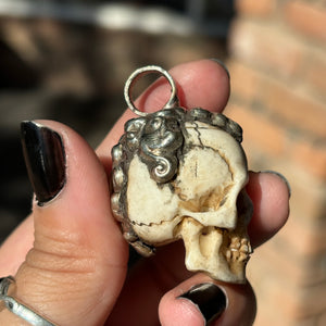 Carved Bone Skull Pendant