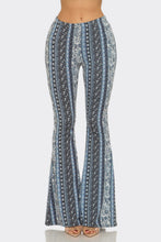 Load image into Gallery viewer, Flared pants with a pattern on a white background
