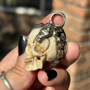 Carved Bone Skull Pendant
