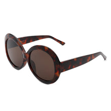 Load image into Gallery viewer, Sunglasses with tortoiseshell frame and dark lenses on a white background
