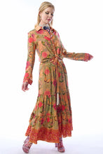 Load image into Gallery viewer, Woman wearing a long, floral dress with a white background
