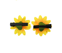 Load image into Gallery viewer, 2 sunflower-shaped hair clips with black bars on a white background
