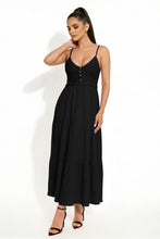 Load image into Gallery viewer, Woman wearing a black dress with buttons on a white background
