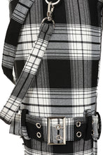 Load image into Gallery viewer, Black and white plaid backpack with a strap and buckle detail.
