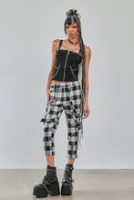 Load image into Gallery viewer, Person wearing a black sleeveless top and plaid pants with platform shoes on a plain background
