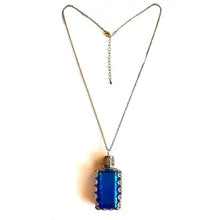 Load image into Gallery viewer, Filigree Metal Enclosed Blue Glass Bottle Necklace
