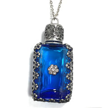 Load image into Gallery viewer, Filigree Metal Enclosed Blue Glass Bottle Necklace
