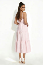 Load image into Gallery viewer, Woman wearing a pink dress with thin straps on a white background
