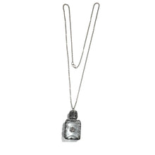 Load image into Gallery viewer, Silver necklace with a blue gemstone pendant on a white background
