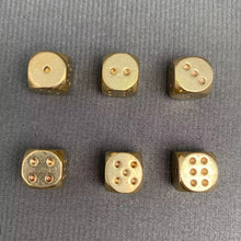Load image into Gallery viewer, Six gold dice on a gray textured surface
