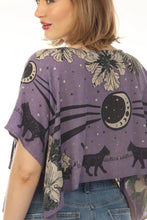 Load image into Gallery viewer, Purple shirt with black cat and moon designs worn by a person
