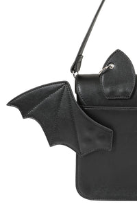 Black bat-winged handbag on a white background