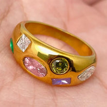 Load image into Gallery viewer, Gold ring with colorful gemstones on a hand
