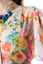 Load image into Gallery viewer, Colorful floral and bird pattern on a garment with a close-up view.
