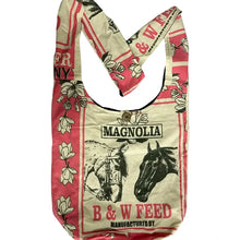 Load image into Gallery viewer, A canvas tote bag featuring a vintage-style 'Magnolia B &amp; W Feed' print with illustrations of horses and floral motifs on a light beige background with pink and red borders.
