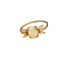 Load image into Gallery viewer, Gold ring with an opal stone on white background
