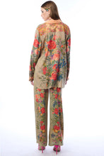 Load image into Gallery viewer, Woman wearing a floral outfit on a white background
