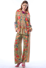 Load image into Gallery viewer, Woman wearing a floral outfit on a white background
