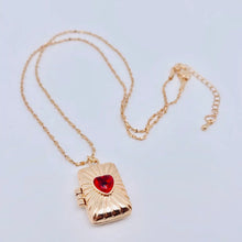 Load image into Gallery viewer, Sacred Heart Red Stone Locket
