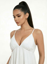 Load image into Gallery viewer, Woman wearing a white dress against a plain background
