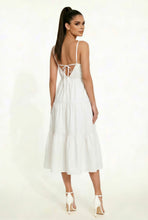 Load image into Gallery viewer, Woman wearing a white dress with thin straps and open back on a white background
