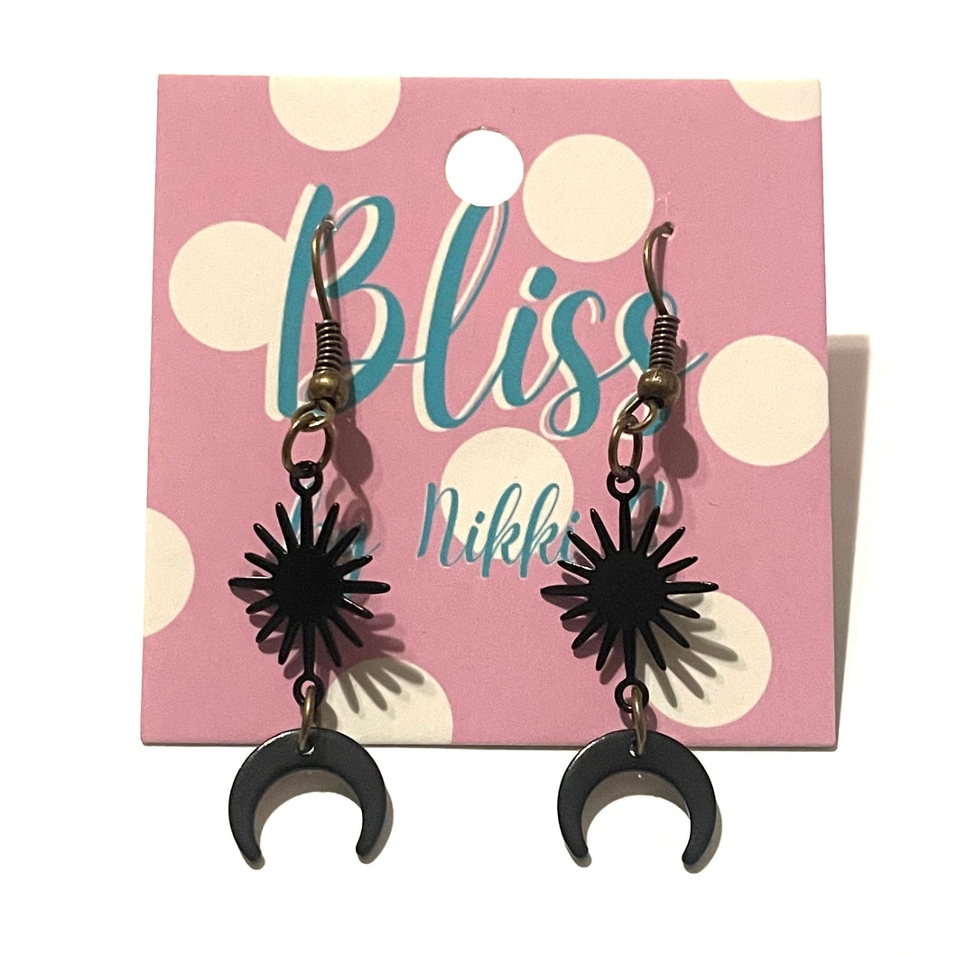 Delicate Starbursts and Horns Statement Earrings