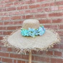Load image into Gallery viewer, Tan Straw Sun Hat with Blue Flower Crown Accent

