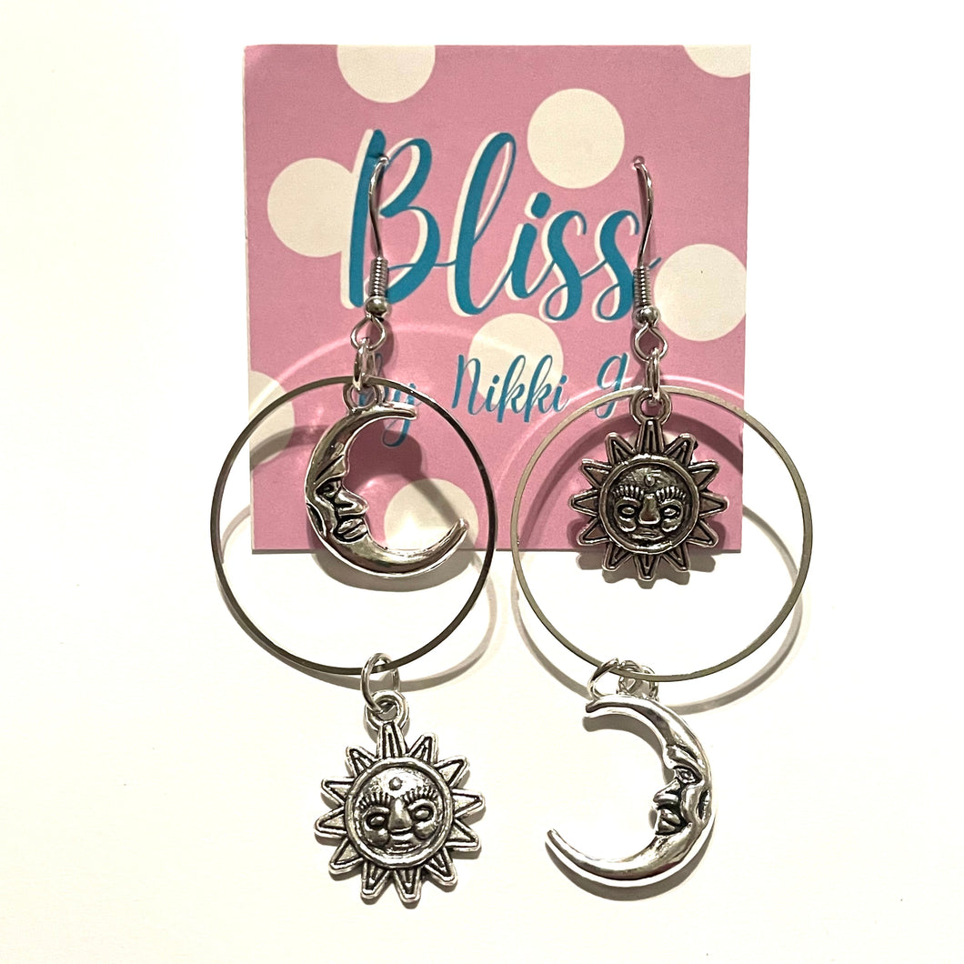 Mismatched Encircled Moon and Sun Statement Earrings