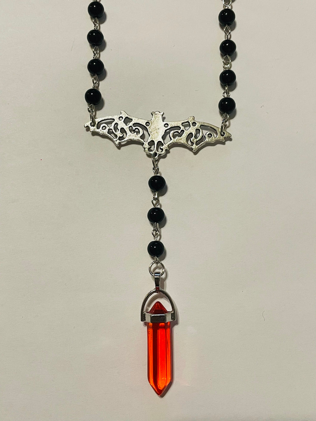 Filigree Bat and Red Crystal Rosary Style Necklace