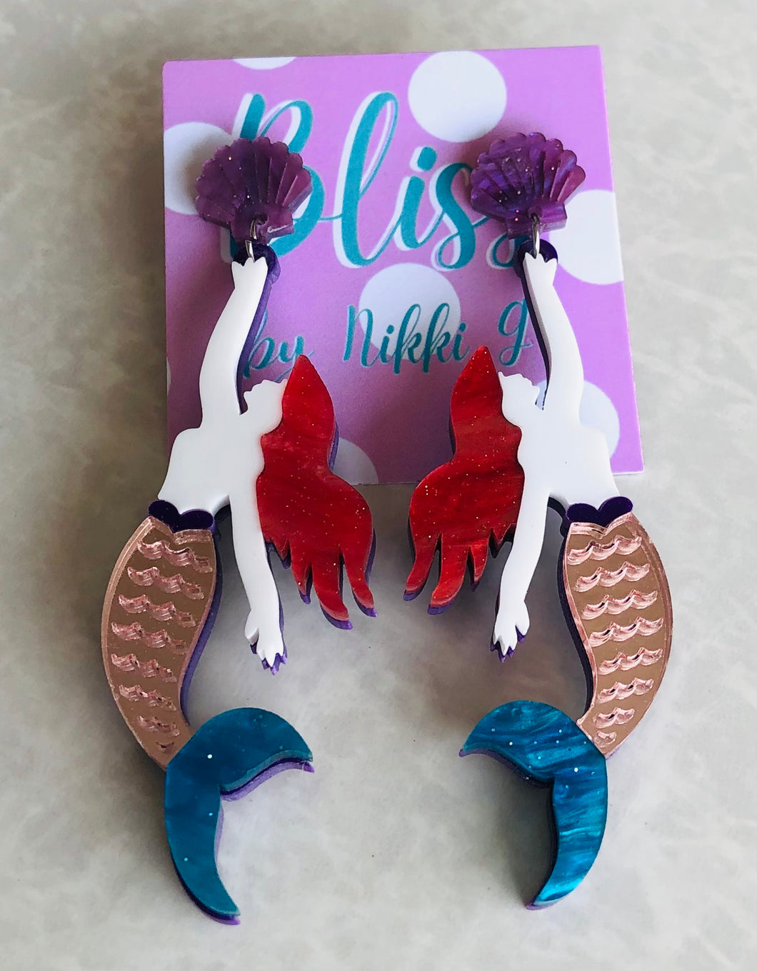Mermaid holding a Shell Acrylic Statement Earring
