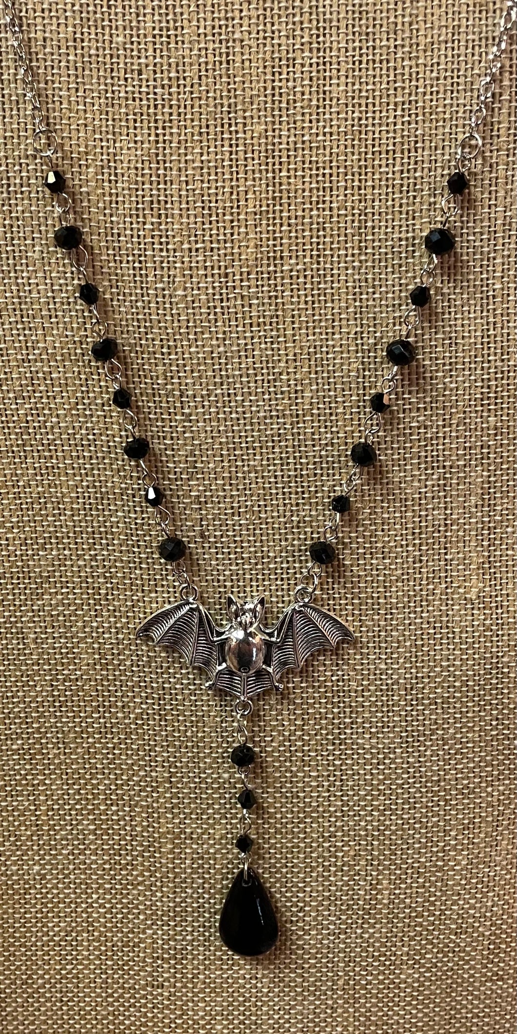 Silver Bat with Black Teardrop and Rosary Style Beads Necklace