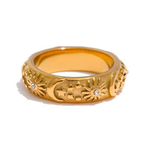 Load image into Gallery viewer, gold band with sun, moon, stars debossed design on ring
